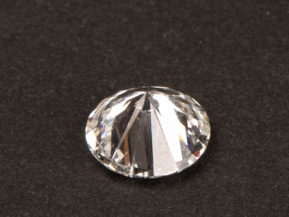 Diamond on paper, round brilliant cut.
Dimensions:...