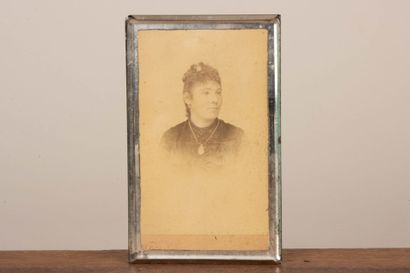 A collection of photographs, including six...