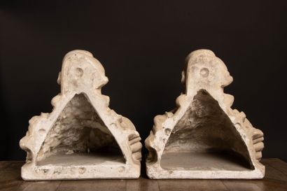 Pair of plaster wall sconces decorated with...