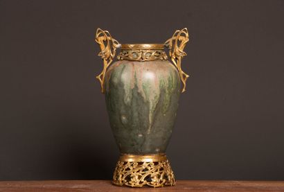 Glazed stoneware vase in shades of green...