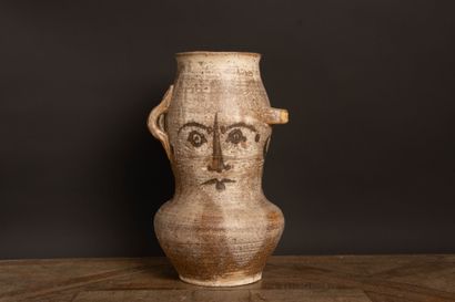 Stoneware vase with three asymmetrical side...