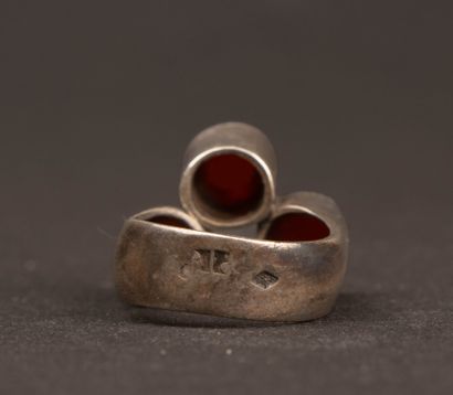 COURREGES Modernist silver ring with a red...