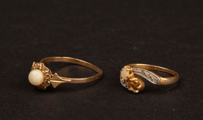 Two antique gold rings; one stone is missing,...