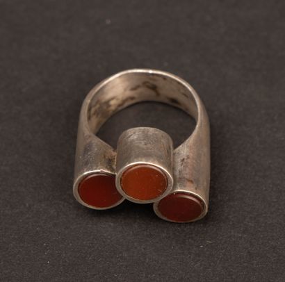 COURREGES Modernist silver ring with a red...