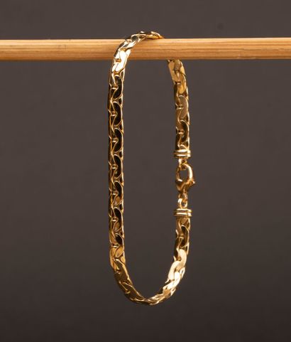Flat link gold bracelet.
750°/00 gold.
L:...