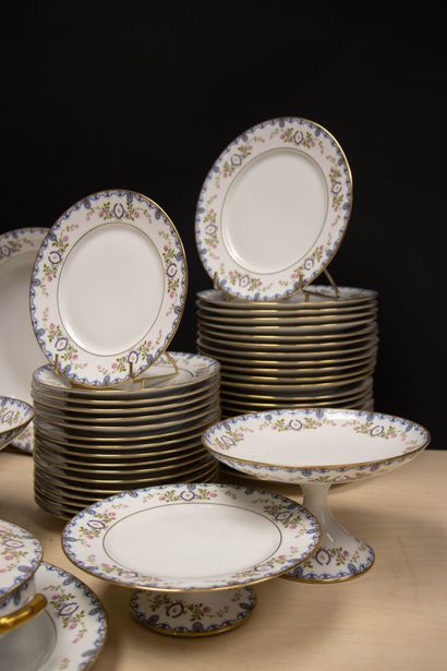 Limoges porcelain dinner service with a floral...
