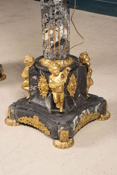 Pair of large marble, gilded bronze, and...