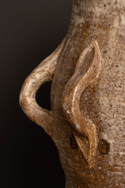 Stoneware vase with three asymmetrical side...