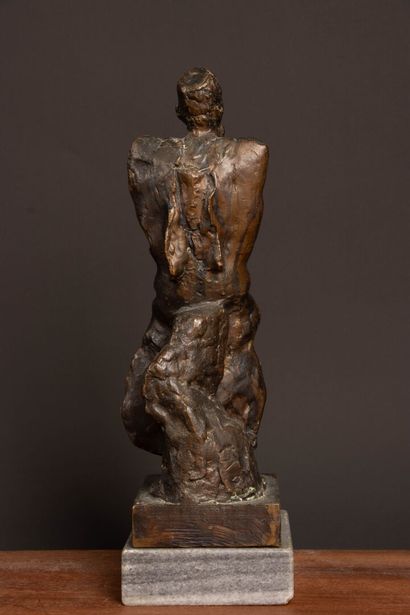 Figurine. 
Patinated bronze sculpture on...