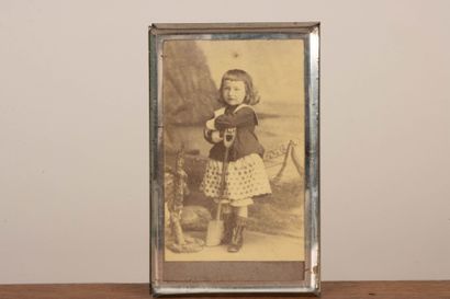 A collection of photographs, including six...