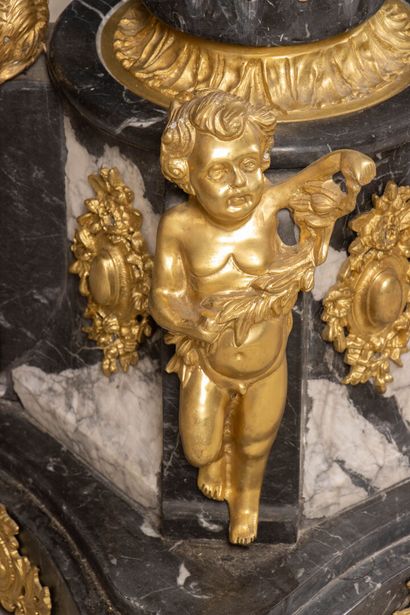 Pair of large marble, gilded bronze, and...