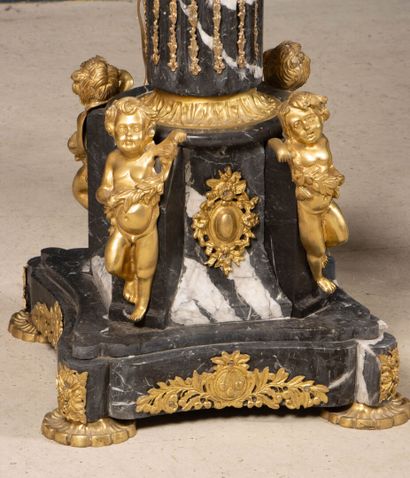 Pair of large marble, gilded bronze, and...