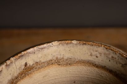 Stoneware vase with three asymmetrical side...