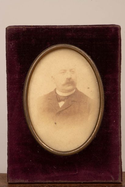 A collection of photographs, including six...