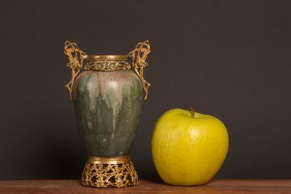 Glazed stoneware vase in shades of green...