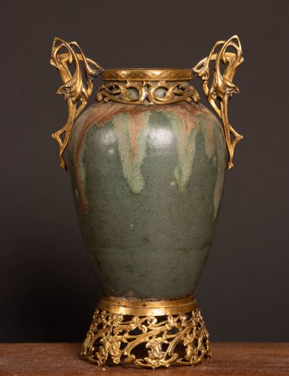 Glazed stoneware vase in shades of green...