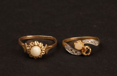 Two antique gold rings; one stone is missing,...