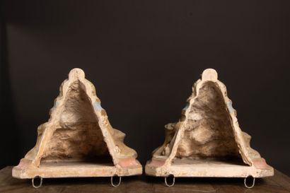 Pair of wall sconces made of patinated plaster
Late...