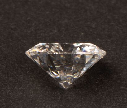 Diamond on paper, round brilliant cut.
Dimensions:...
