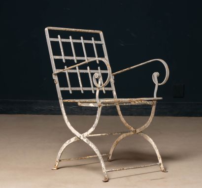 Folding garden chair made of woven iron and...