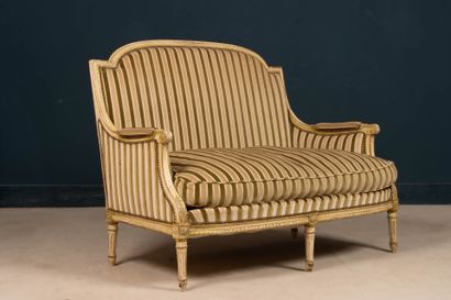 Pair of carved wooden sofas, upholstered...