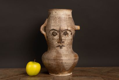 Stoneware vase with three asymmetrical side...