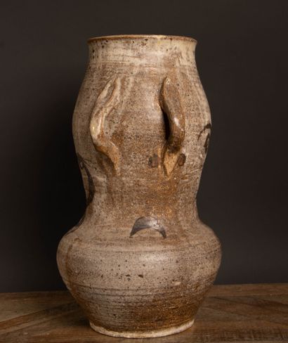 Stoneware vase with three asymmetrical side...