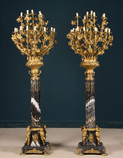 Pair of large marble, gilded bronze, and...