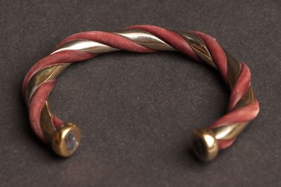 HERMÈS 
Silver plated metal bangle with twisted...