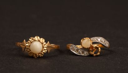 Two antique gold rings; one stone is missing,...
