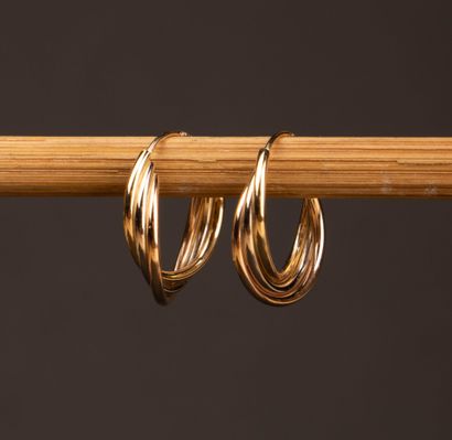 Two pairs of gold earrings.
750°/00 gold
H:...