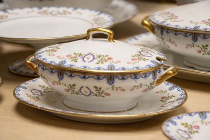 Limoges porcelain dinner service with a floral...