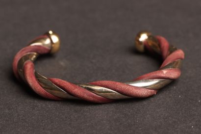 HERMÈS 
Silver plated metal bangle with twisted...