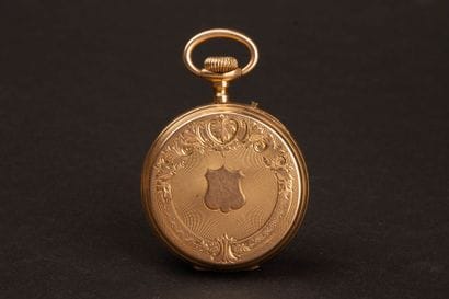 Gold pocket watch, gold-plated metal dust...