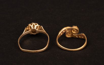 Two antique gold rings; one stone is missing,...