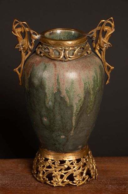 Glazed stoneware vase in shades of green...