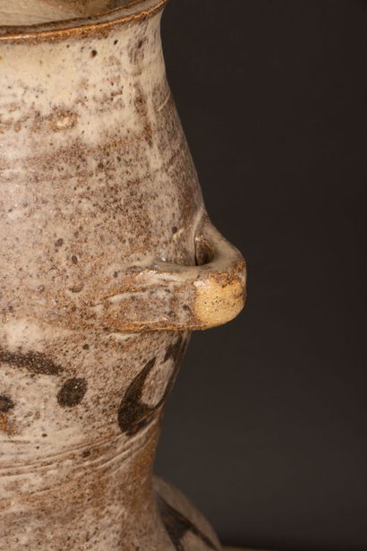 Stoneware vase with three asymmetrical side...