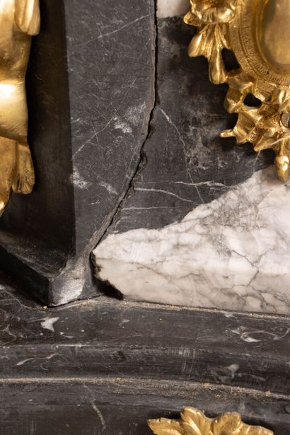 Pair of large marble, gilded bronze, and...