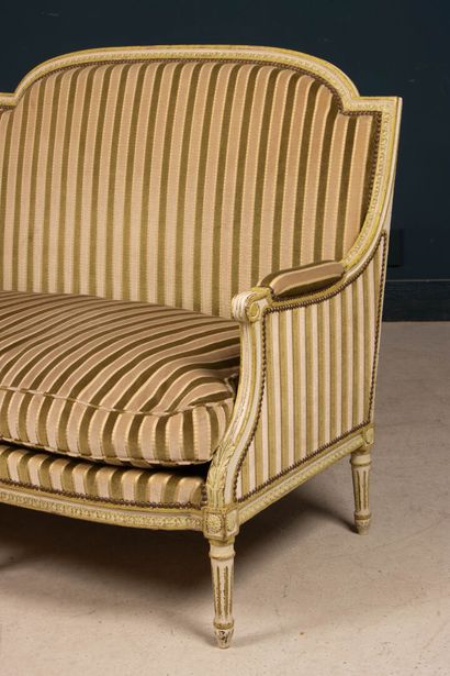 Pair of carved wooden sofas, upholstered...