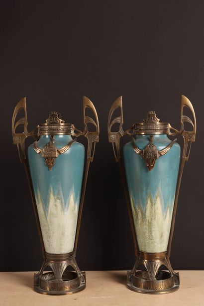 Pair of ceramic vases with nuanced blue enamel...