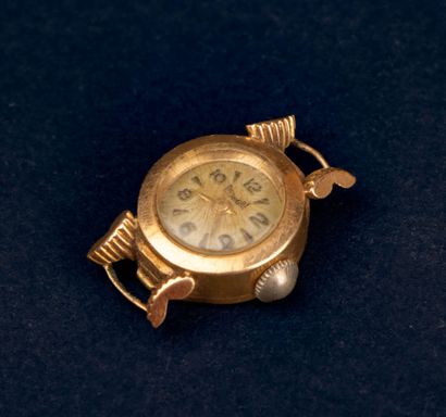 Women's gold watch case.
750°/00 gold. 
1950s.
Diameter:...