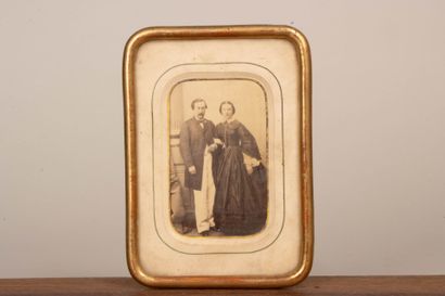 A collection of photographs, including six...