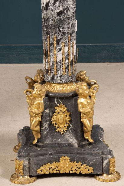 Pair of large marble, gilded bronze, and...