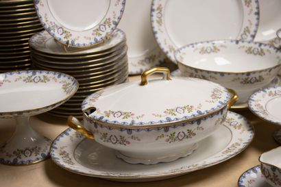 Limoges porcelain dinner service with a floral...
