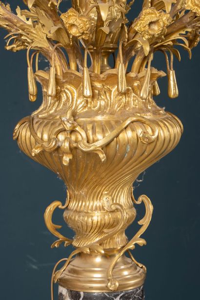 Pair of large marble, gilded bronze, and...