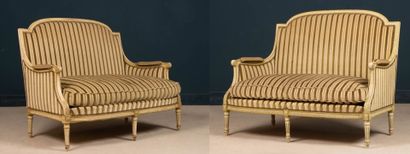 Pair of carved wooden sofas, upholstered...