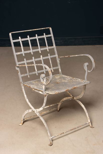 Folding garden chair made of woven iron and...