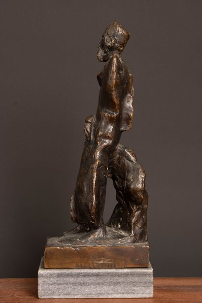 Figurine. 
Patinated bronze sculpture on...