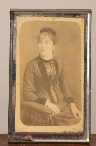 A collection of photographs, including six...
