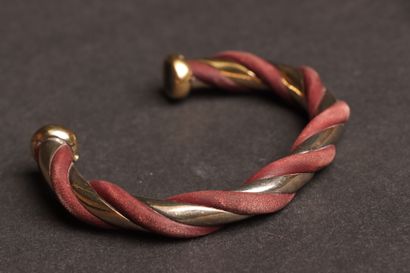 HERMÈS 
Silver plated metal bangle with twisted...